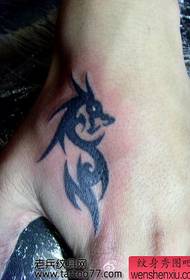 a hand back tiger mouth totem dragon tattoo pattern