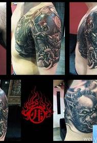 En cool halvarms demonkonge og Sun Wukong tatoveringsbillede fra ilden