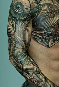 Ziedu rokas mehāniskais pus bruņu tetovējums ir šarmu pilns