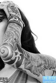 Flower arm female tattoo pattern
