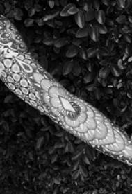 Girl arm on black gray sketch geometric element creative pattern beautiful flower arm tattoo picture