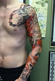 Point thorn dragon flower arm tattoo pattern
