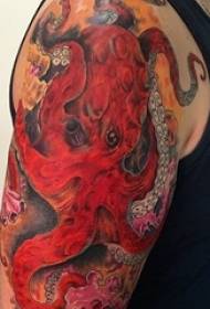 Jongens arm geschilderd aquarel schets creatieve octopus bloem arm tattoo foto