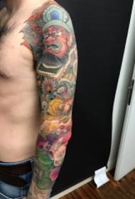 Domineering judge and goldfish flower arm tattoo pattern