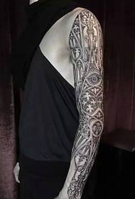 Very masculine flower arm tattoo