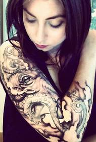 Beauty flower arm octopus tattoo image