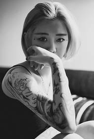 Short hair hipster beauty flower arm tattoo picture