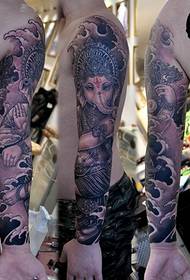 Flower arm tattoo - elephant god - art tattoo