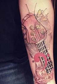 Young man who loves music, flower arm guitar tattoo pattern