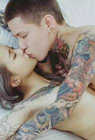 Passionate hot hipster couple flower arm tattoo pictures