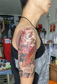 Skinny boy's personality flower arm squid tattoo