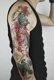 Very clear and beautiful flower arm totem tattoo