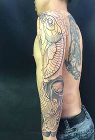 Men's black and white squid flower arm tattoo