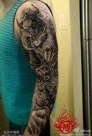 Cow devil flower arm tattoo pattern