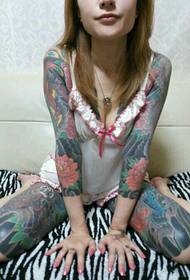 Savage beauty has a wonderful flower arm tattoo