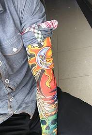 Very eye-catching flower arm tattoo picture