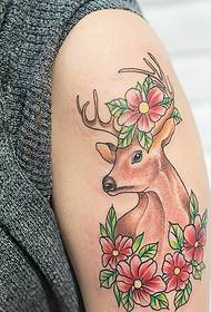 Fawn and flower personality flower arm tattoo tattoo