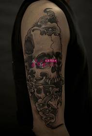 creative black and white silk flower arm tattoo