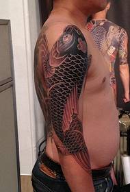Stylish squid flower arm tattoo