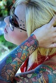 a woman color flower arm tattoo pattern to enjoy the picture