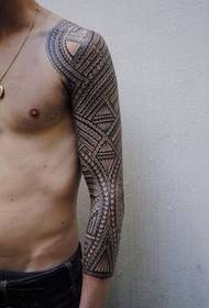 handsome totem flower arm tattoo
