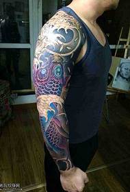 Flower arm purple squid tattoo pattern