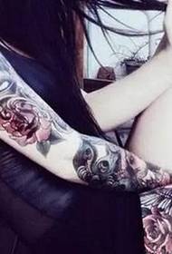 Flower-arm tattoo for beauty-type men