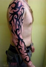 Boys arm on black line creative totem flower arm tattoo picture