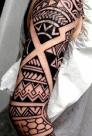 Schoolboy arm on black line creative geometric element tribal flower arm tattoo picture