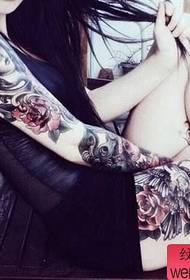 woman flower arm flower leg tattoo works