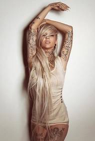 Beautiful woman with beautiful flower arm English word tattoo