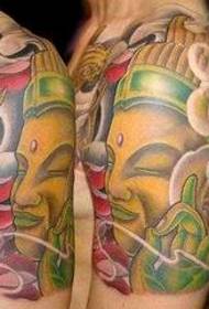 Half-bow tattoo pattern: color half-bow Buddha head squid tattoo pattern