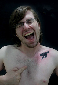 foreigner clavicle cannon tattoo