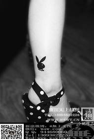 leg play boy rabbit tattoo