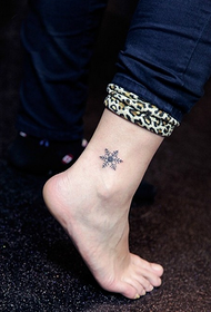 ankle beautiful small snow totem tattoo