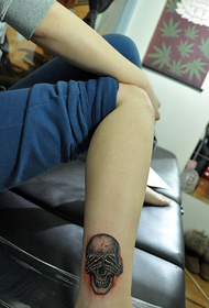 grožio kojos populiarus mielas kaukolės tatuiruotės modelis