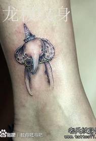 Another-style elephant tattoo pattern at the ankle