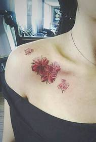 The beautiful flower tattoo pattern under the clavicle of the goddess