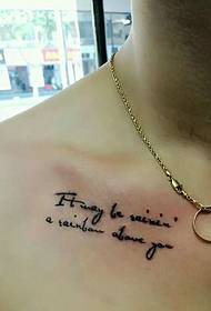 simple English tattoo tattoo under the man's clavicle