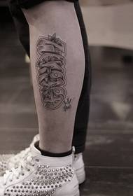 black and white English ankle tattoo picture