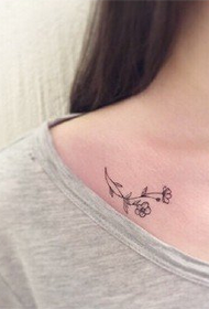 clavicle flower tattoo