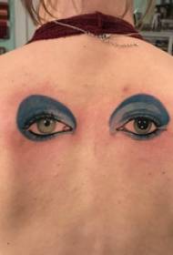 τατουάζ πίσω γυναικείο κορίτσι στο πίσω μέρος της έγχρωμης εικόνας τατουάζ μάτι