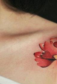 sexy goddess under a collar of a watercolor flower tattoo tattoo