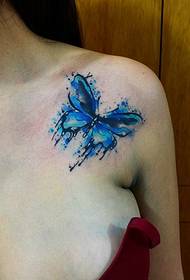 watercolor blue butterfly tattoo pattern on the side of the collarbone