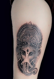 female calf like a god tattoo