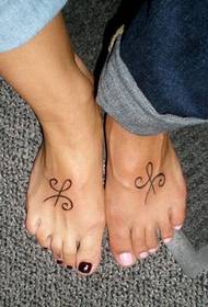 tatuatge símbol de personalitat de turmell de parella