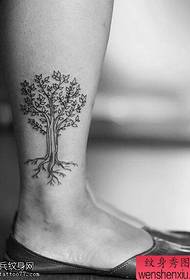 female ankle tree tattoo pattern