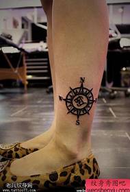 female ankle compass tattoo pattern