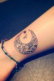 very stylish and beautiful moon totem tattoo