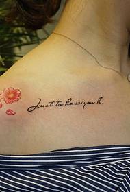 English tattoos with small cherry blossoms under the collarbone